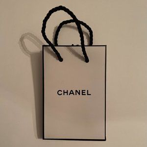 Tiny authentic Chanel cute white shopping bag w/ black rope handles